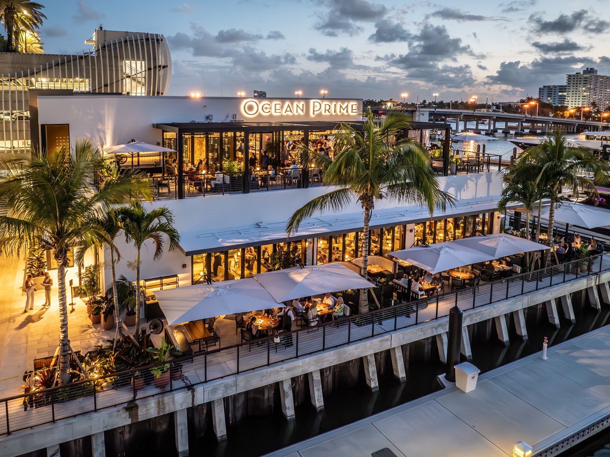 Ocean Prime Fort Lauderdale — twilight waterfront with Euro-Wall glazing by ACG